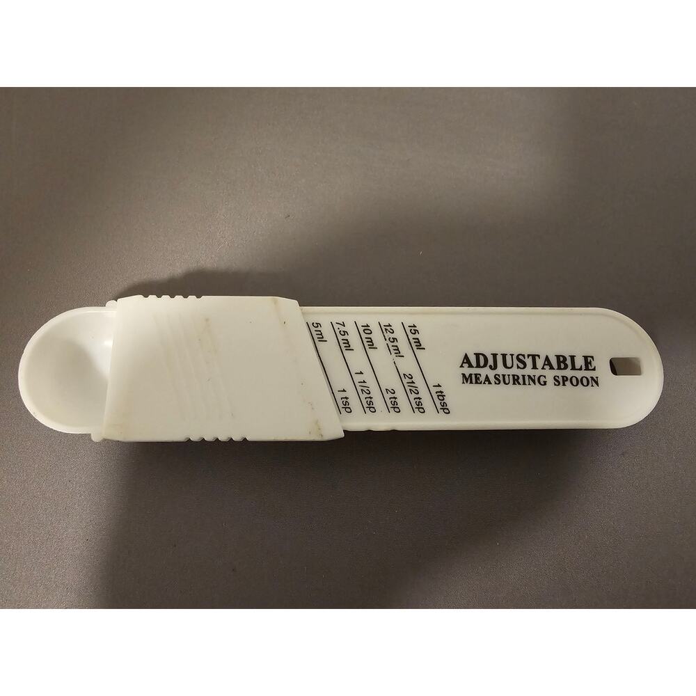 White 5-in-1 Adjustable Measuring Spoon - 1 tsp to 1 TBSP - 6" (inches) long